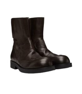 Brown MM6 Maison Margiela biker boots with a bold silhouette and contemporary utilitarian aesthetic