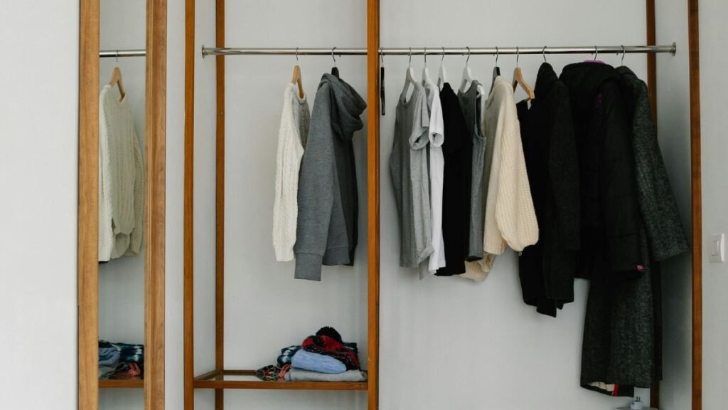Clothes hanging on a wooden rack