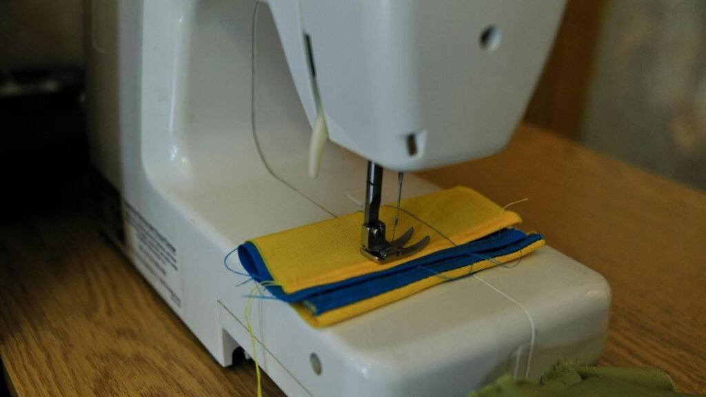 Sewing machine with colorful fabric pieces