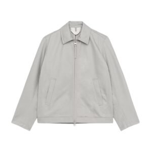 Arket cotton drizzler jacket in grey worn as a lightweight everyday layer