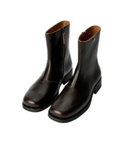 Our Legacy Camion boots worn for everyday city walking and casual outfits