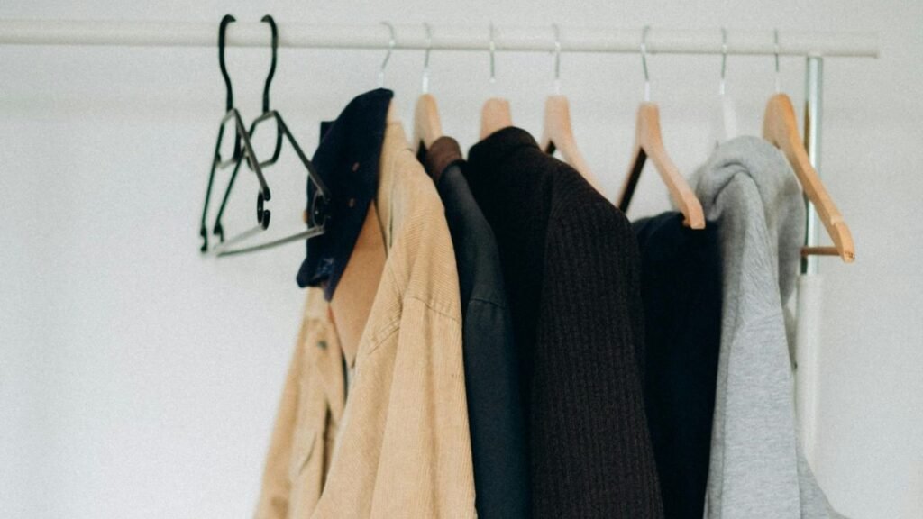 Hangers with various clothing items